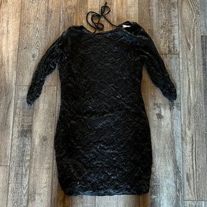 Long laced top. Runs a little small. Could be worn as a dress with tights.